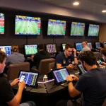 VIN88 sports bettors engaged in excitement while analyzing live game odds