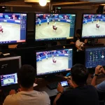 Watch WALA88 đá gà live stream in action featuring multiple cockfighting matches displayed on high-definition screens