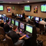 Engaging sports betting atmosphere at kkeonhacai with bettors placing wagers on live matches